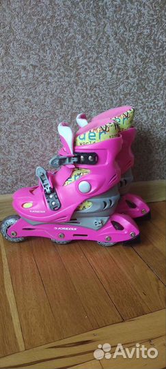 Роликовые коньки