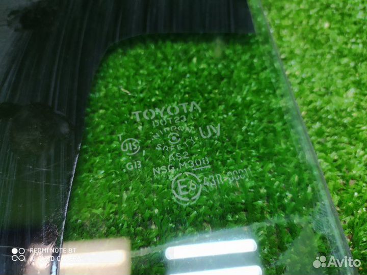 Стекло двери заднее правое Toyota Corolla 150