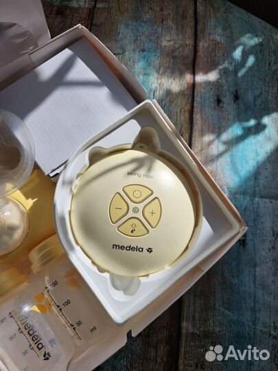 Молокоотсос двойной medela swing maxi