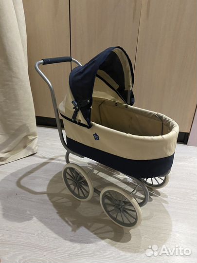 Игрушечная коляска для кукол