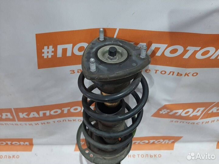 Стойка амортизатора передняя левая Mazda CX-5 KE