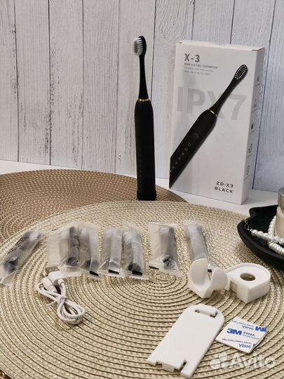 Электрическая зубная щетка/новая