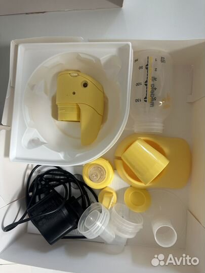 Молокоотсос medela электрический