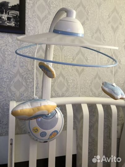 Музыкальная карусель на кроватку chicco