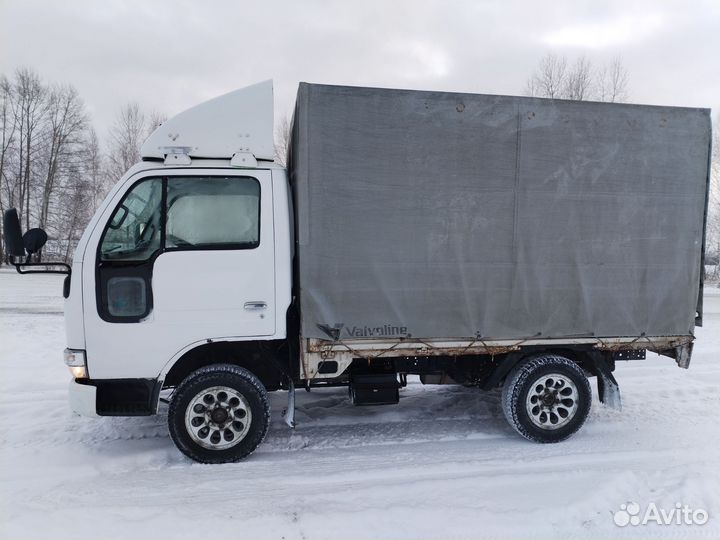 Бортовой грузовик Nissan Atlas, 1997