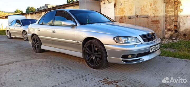 Накладки бамперов, спойлера, пороги опель омега б