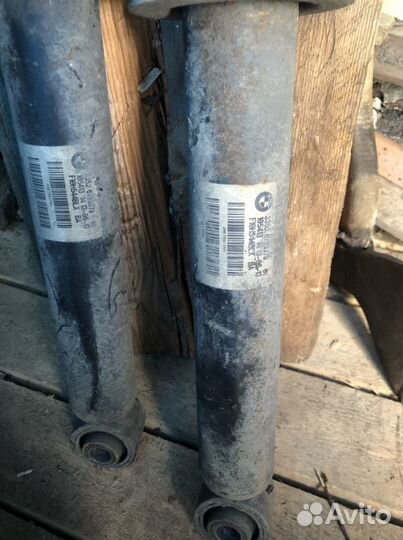 Стойки амортизатора задние BMWf10