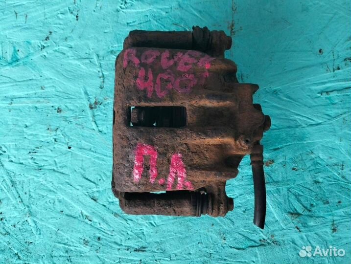 Суппорт передний левый Rover400