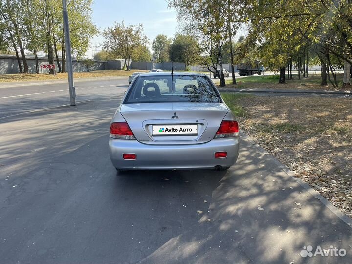 Mitsubishi Lancer 1.6 МТ, 2006, 165 480 км