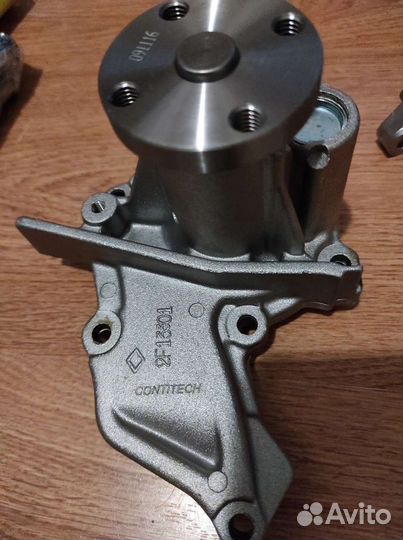 Помпа mazda демио