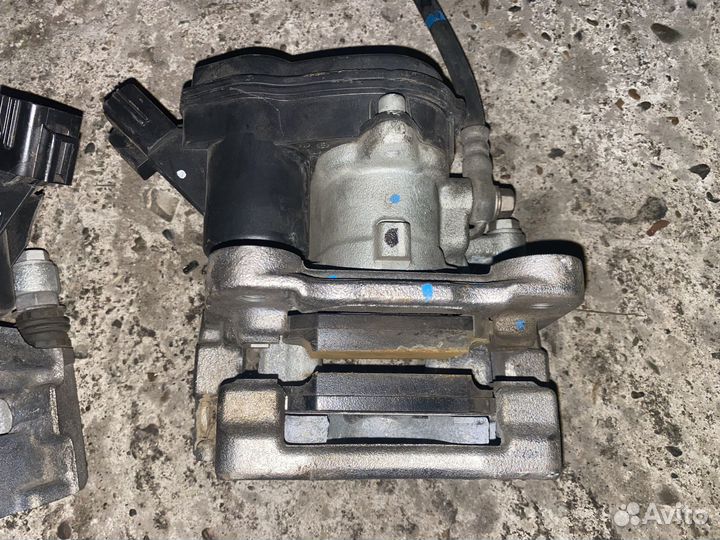 Суппорт тормозной задний левый правый Mazda 3-6