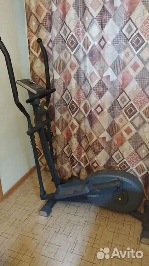 Эллиптический тренажер torneo