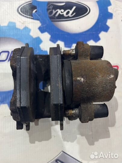 Суппорт тормозной передний левый Skoda Octavia A5