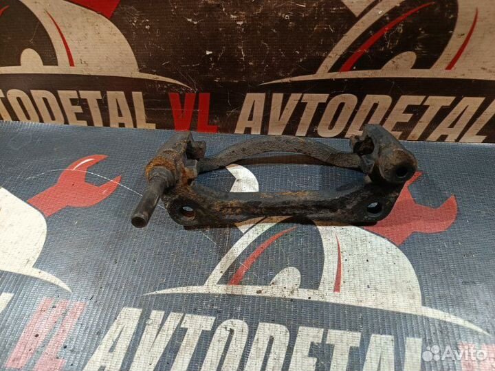 Скоба суппорта передняя левая Hyundai Accent 1 X3