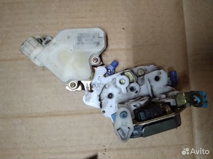 Замок передний левый Nissan Almera classic