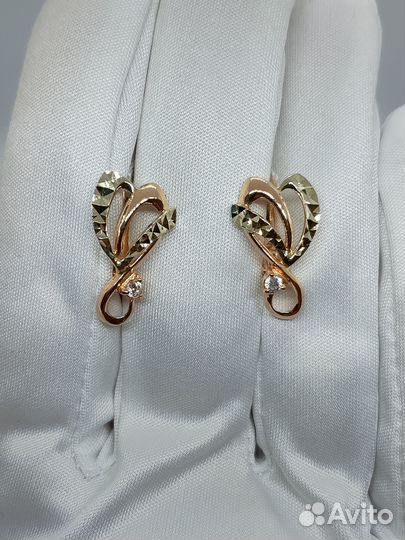 Золотые серьги с камнем