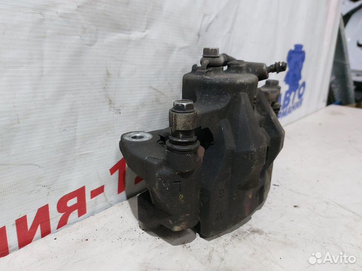 Суппорт тормозной передний левый Toyota Corolla