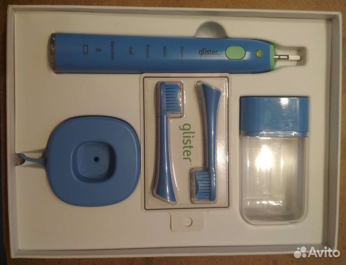 Электрическая зубная щетка