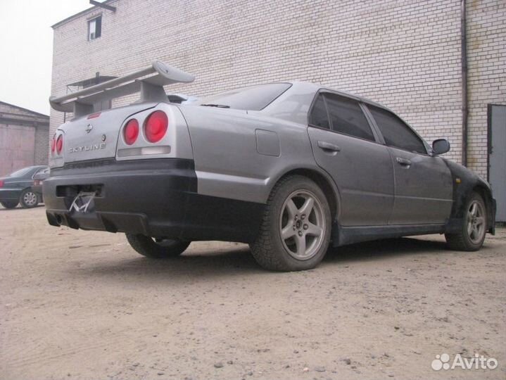 Задний бампер GTR Japan на Nissan Skyline R34 седа