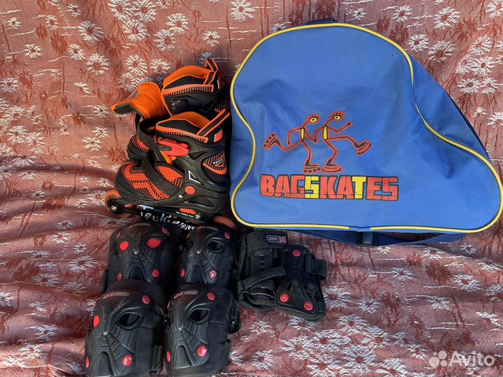 Роликовые коньки