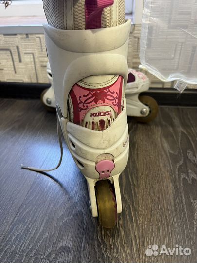Роликовые коньки