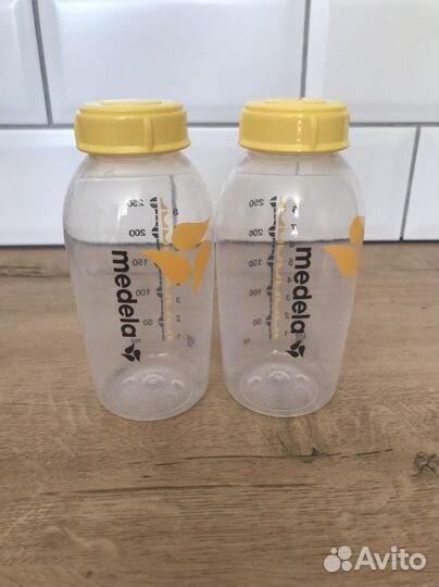 Молокоотсос medela 2 бутылочки,смарт соска