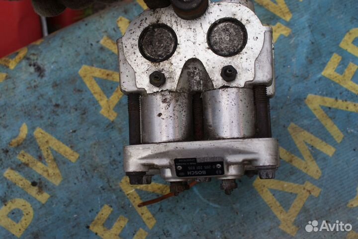 Блок насос ABS Nissan primera P10