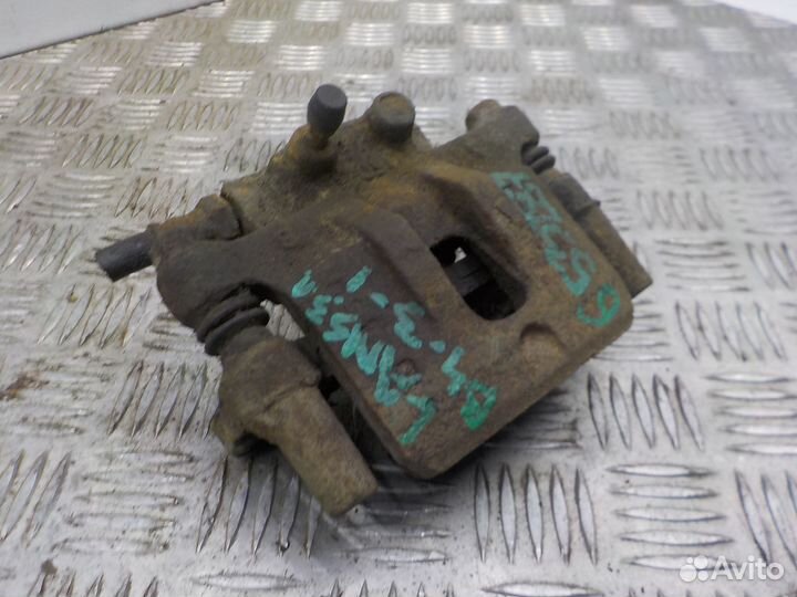 Суппорт тормозной задний левый Mitsubishi Lancer X