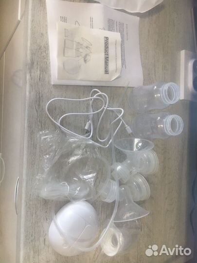 Молокоотсос электрический новый
