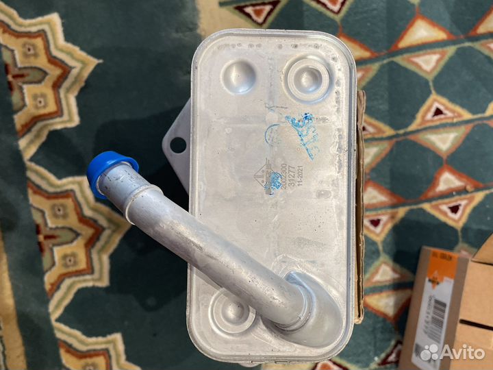 Радиатор охлаждения масла двигателя