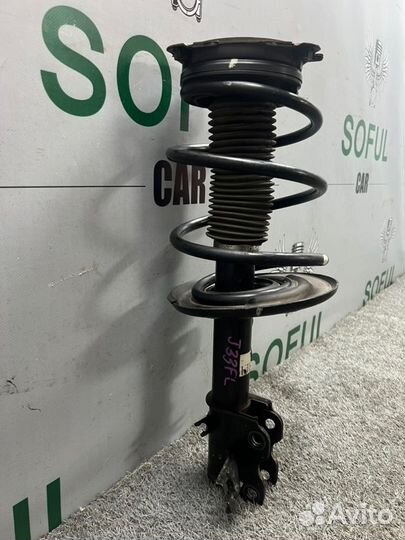 Стойка амортизатора передняя левая Nissan Teana