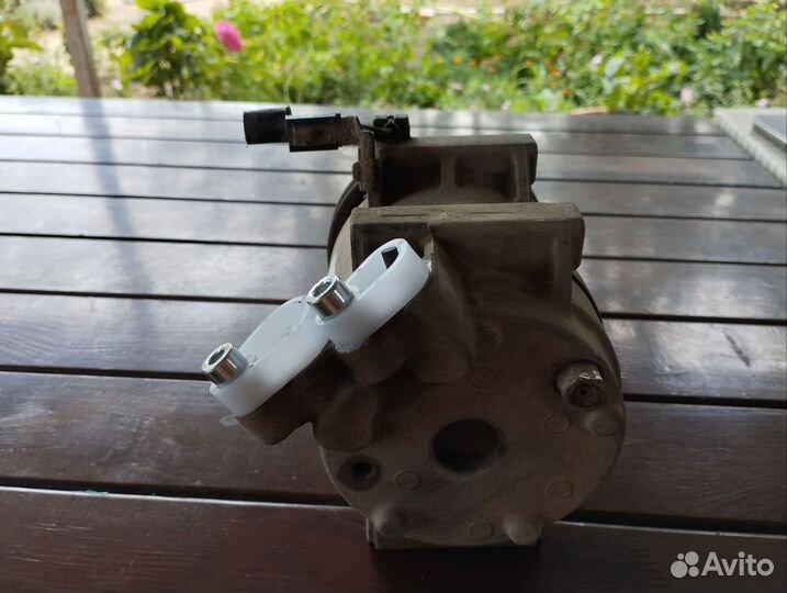 Компрессор кондиционера Митсубиси л 200