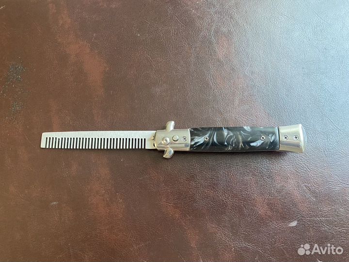 Кнопочная металическая расческа