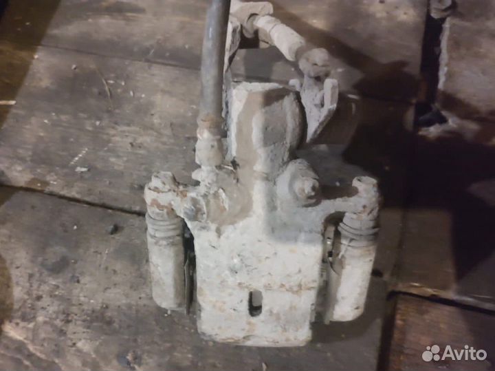 Суппорта задние Nissan Almera N 15