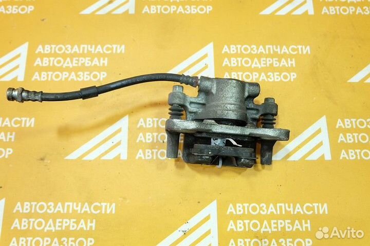 Суппорт тормозной зад правый Mitsubishi Lancer X