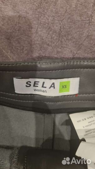 Шорты кожзам женские