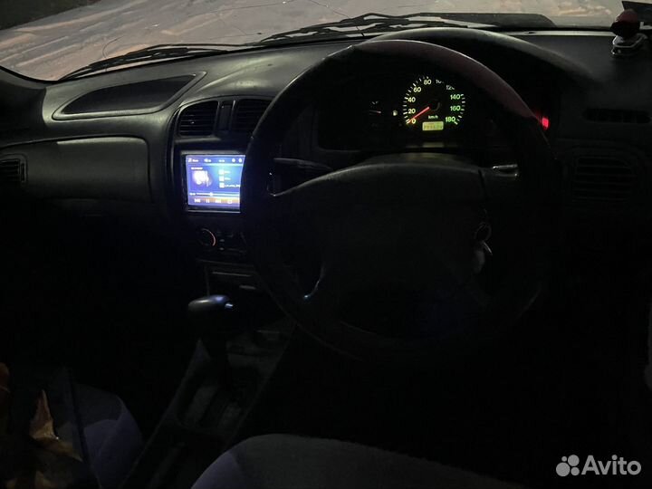 Mazda Familia 1.3 AT, 1999, 200 000 км