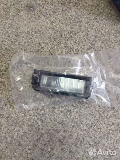 Фонарь подсветки заднего номера Kia Rio 92502f6000