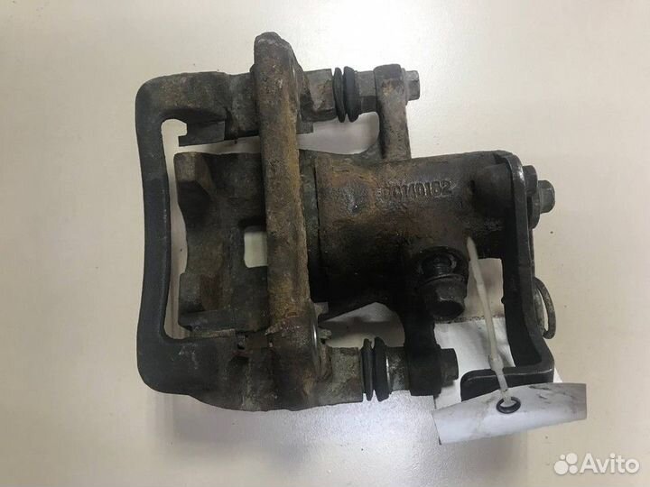 Суппорт задний левый Kia Rio