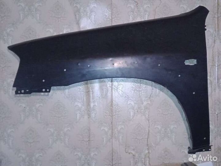 Крыло переднее левое с отверстиями мазда трибьют