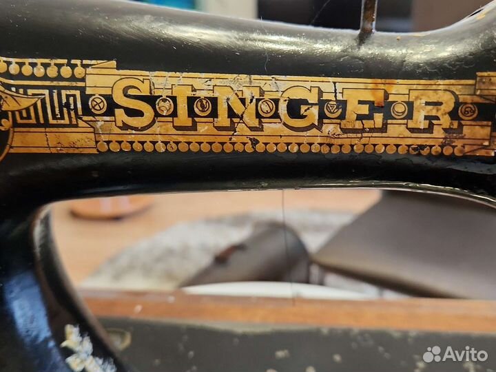 Антикварная швейная машина Зингер