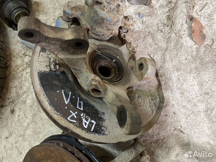 Поворотный кулак Mitsubishi Lancer 7