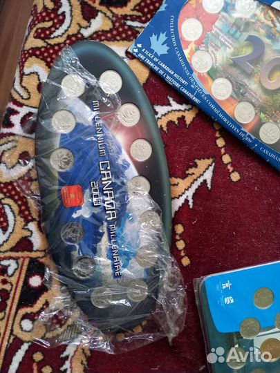 Наборы монет Канады и Бразилии