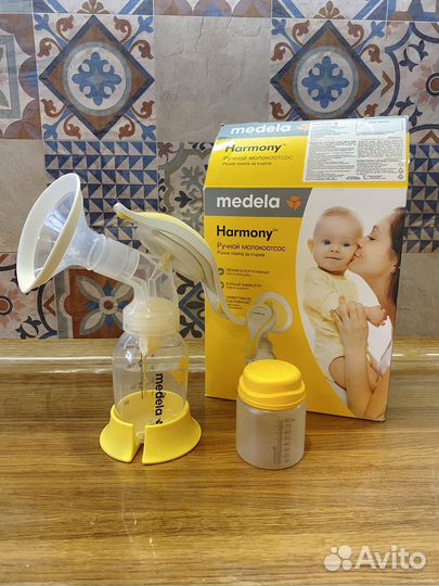 Молокоотсос medela ручной