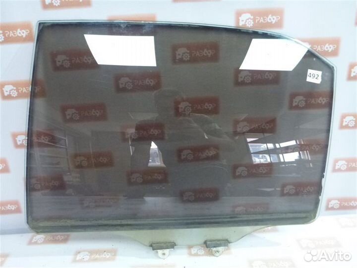 Стекло двери заднее левое Mitsubishi Lancer CS1A