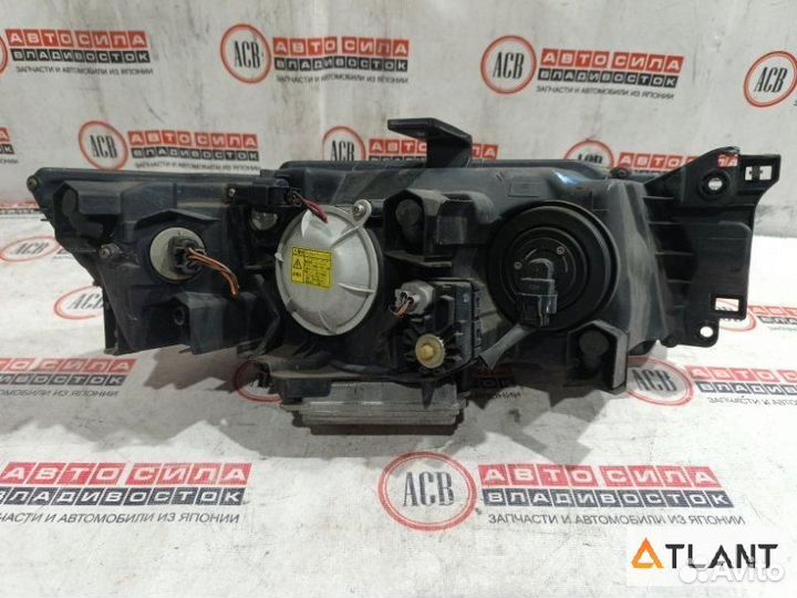 Фара левая mitsubishi chariot grandis