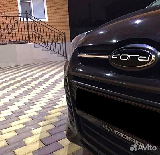 Наклейки на эмблемы Ford Focus