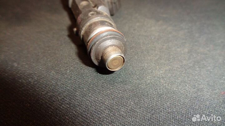 Форсунка инжекторная Opel Corsa D