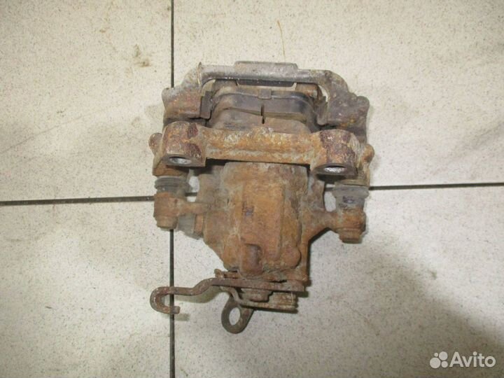 Суппорт задний правый VW Jetta 6 (1B)