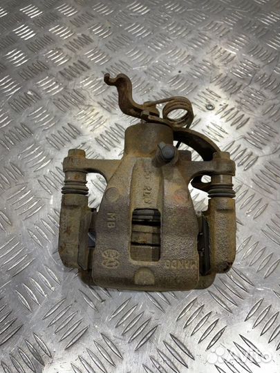 Суппорт задний правый Hyundai Solaris седан G4FC